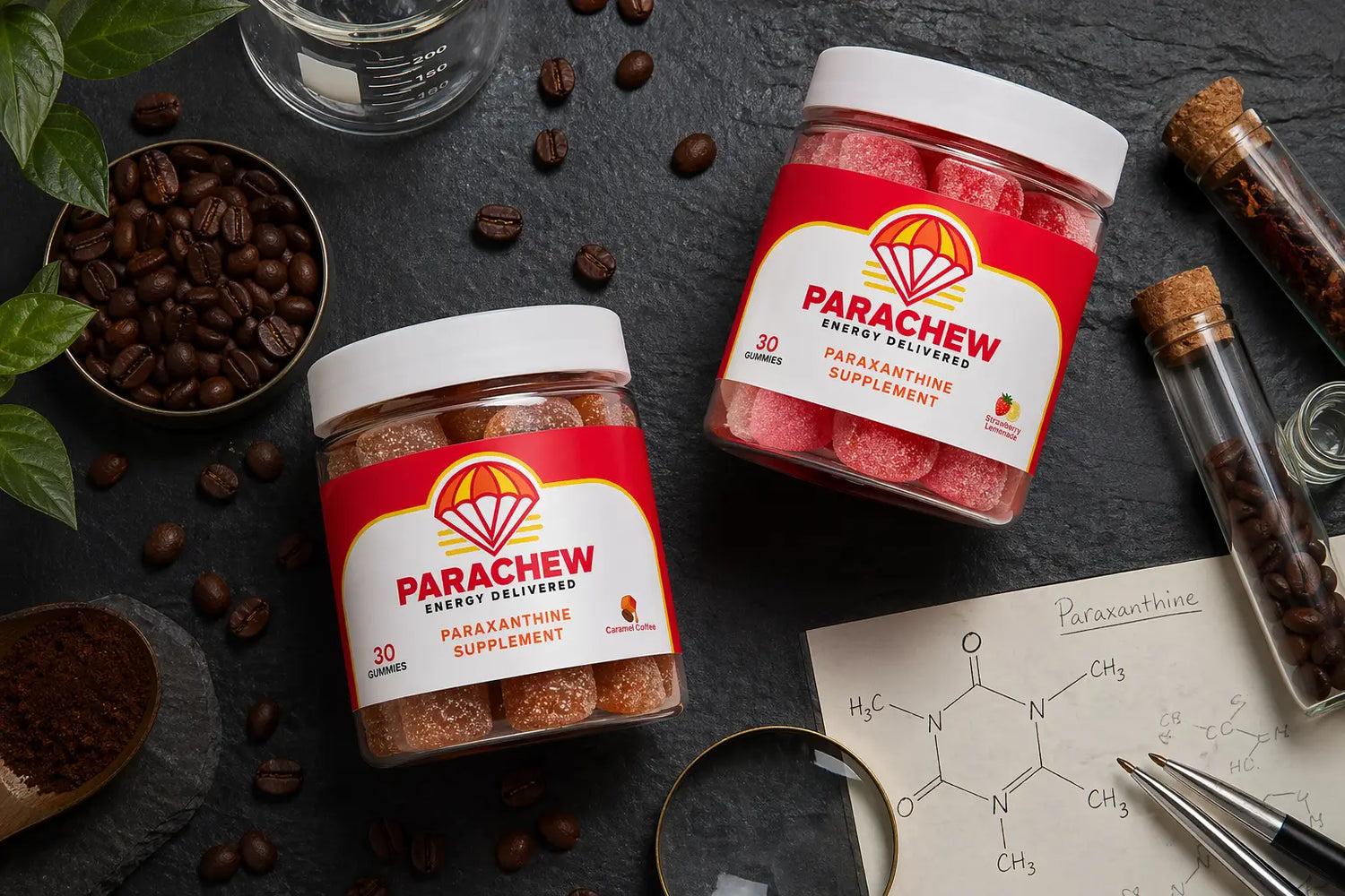 Parachew paraxanthine energy gummies on a dark slate surface next to scattered coffee beans representing caffeine as the source