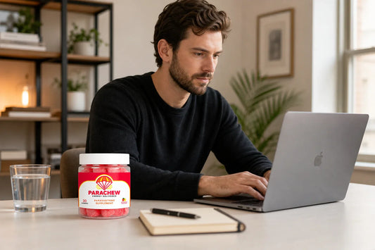 High-performer at a modern desk with Parachew gummies, representing paraxanthine and focus demands research