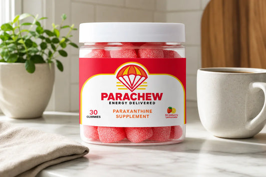 Parachew energy gummies beside a glass of green tea on a gym counter, paraxanthine vs green tea clean energy comparison